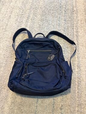 navy blue tumi convertible backpack Voyageur Celina ring and loops that are compatible with select TUMI+ accessories Bag Tumi Plaza Tumi Voyageur